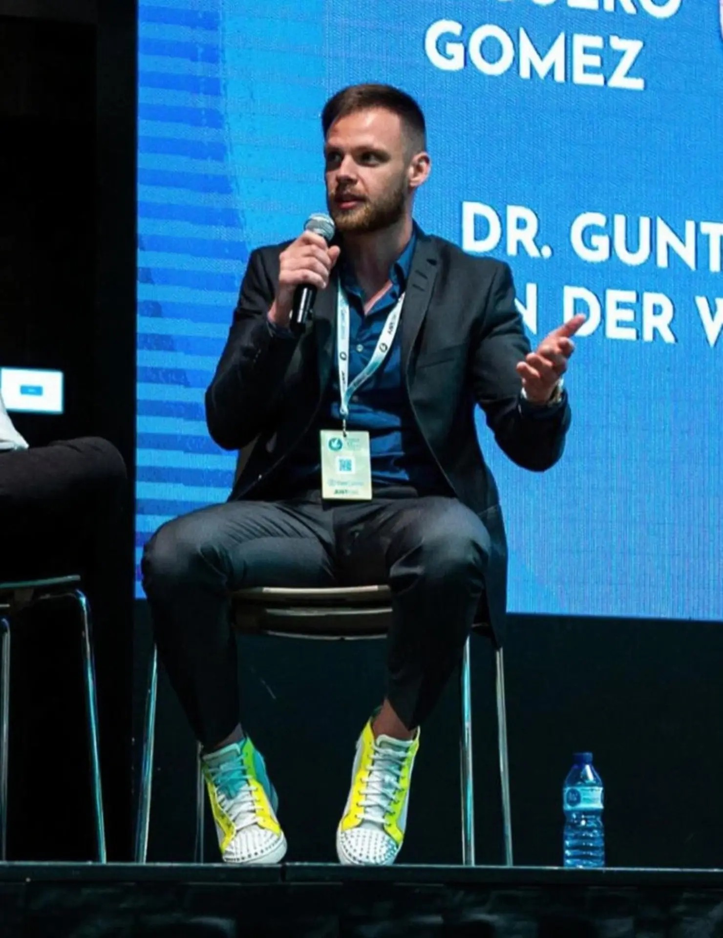 Andreas Vezonik in conversation at an industry event